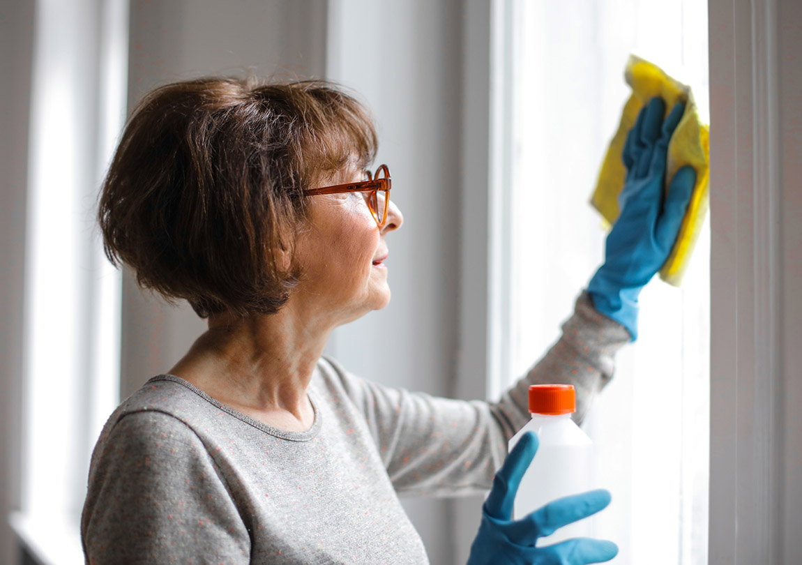 Older woman cleaning