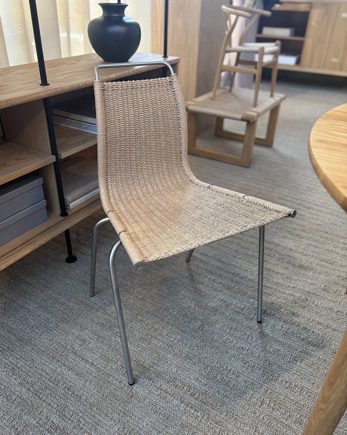 The PK1 chair by Poul Kjærholm.